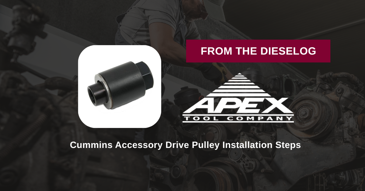 Step-by-step close up layout of heavy-duty Cummins accessory drive pulley installer tool resting on a repair bench